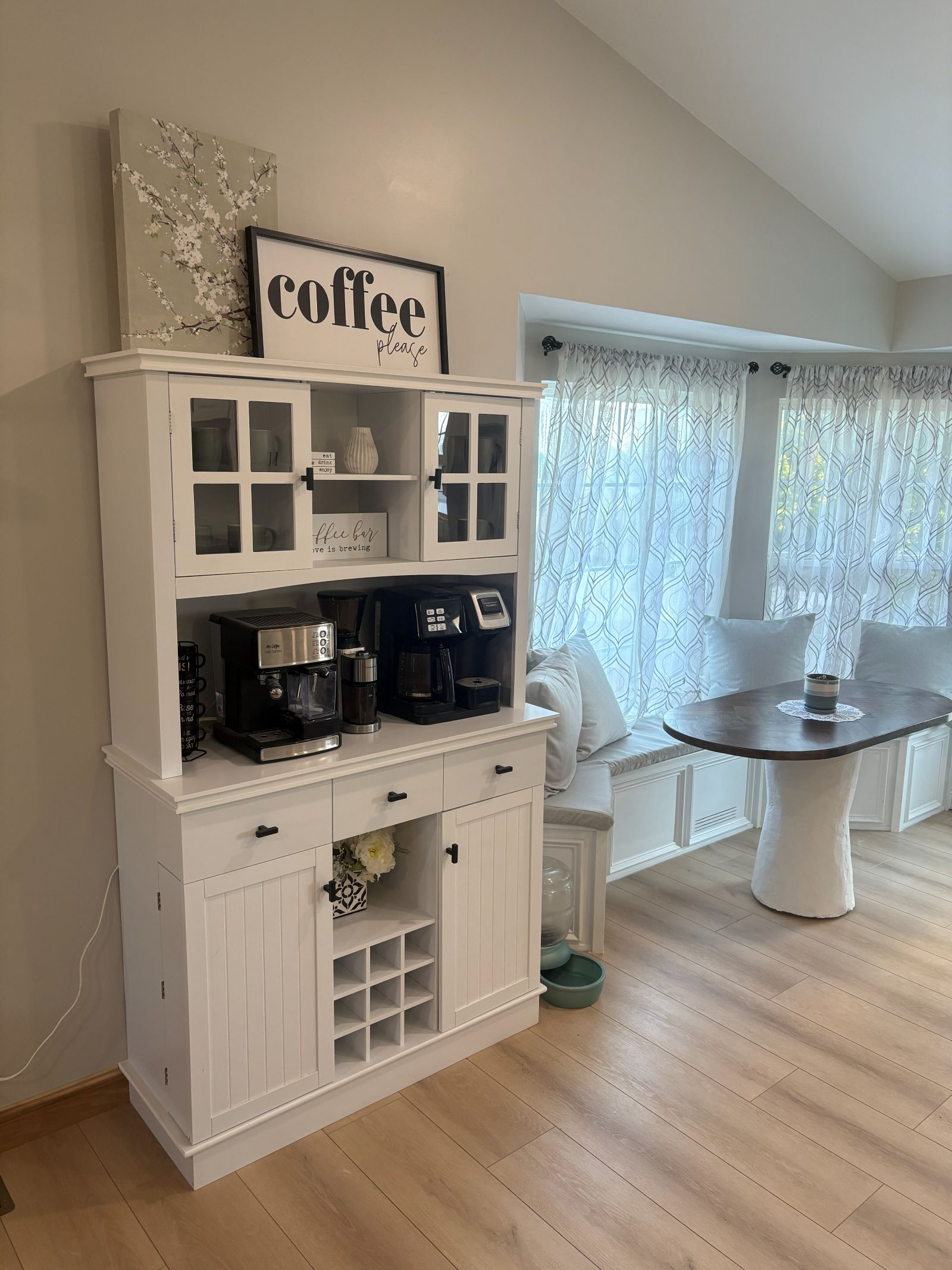 Built-in coffee bar cabinet beside the breakfast nook